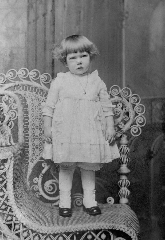 Detail of Toddler girl stands for a portrait, ca. 1923. by Anonymous