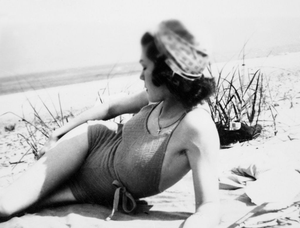 Detail of Young woman at the beach, ca. 1938 by Corbis