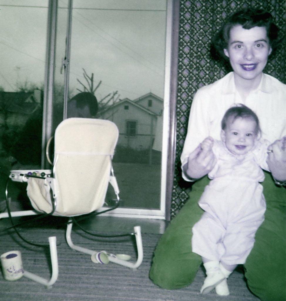 Detail of Proud new mother with baby, ca. 1956. by Anonymous