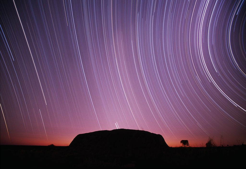 Detail of Ayers Rock and Star Trails, Ulru - Kata Tjuta National Park, Australia by Corbis