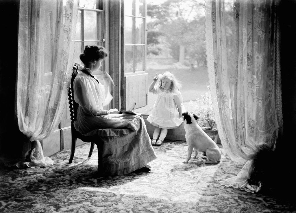 Detail of A young girl with her mother and dog in England, ca. 1900. by Anonymous