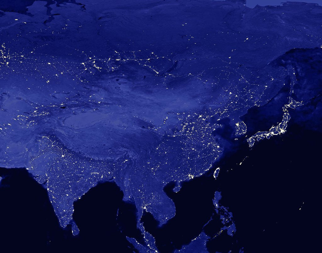 Night time satellite view of China and Siberia by Corbis