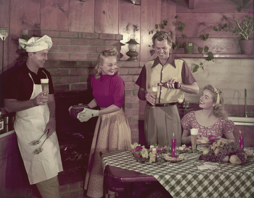 Detail of 1950s 2 couples cooking picnic in rustic kitchen drinking beer by Anonymous