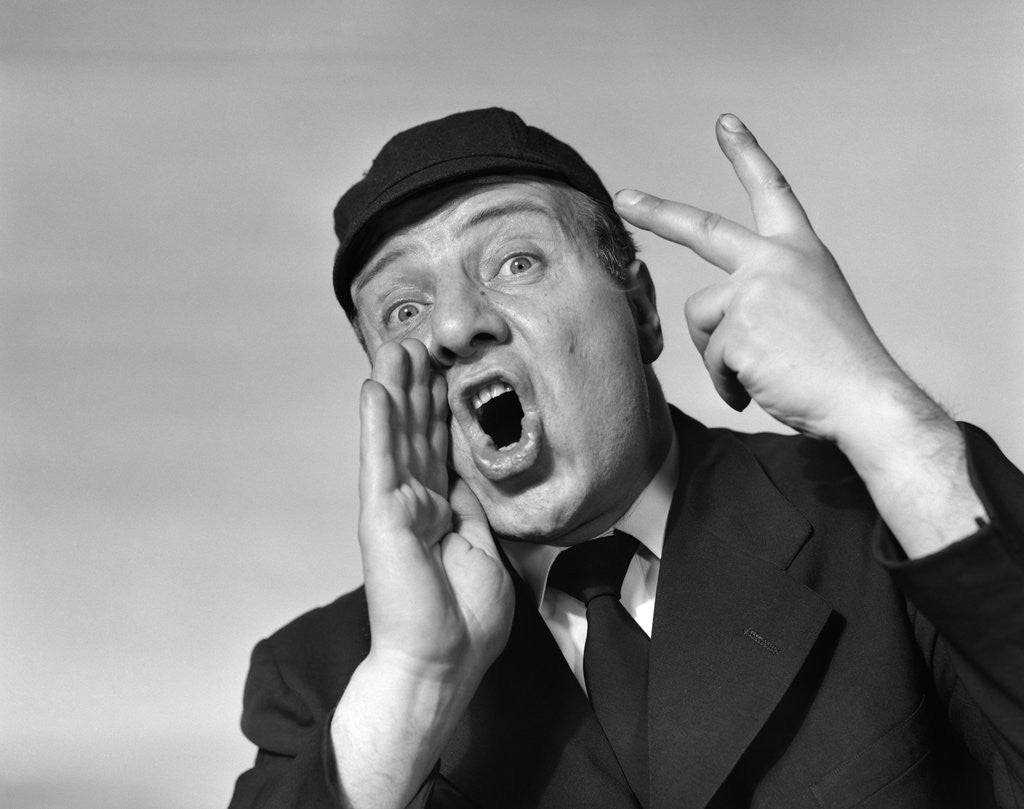 Detail of 1950s baseball umpire calling a ball or a strike or an out looking at camera by Anonymous