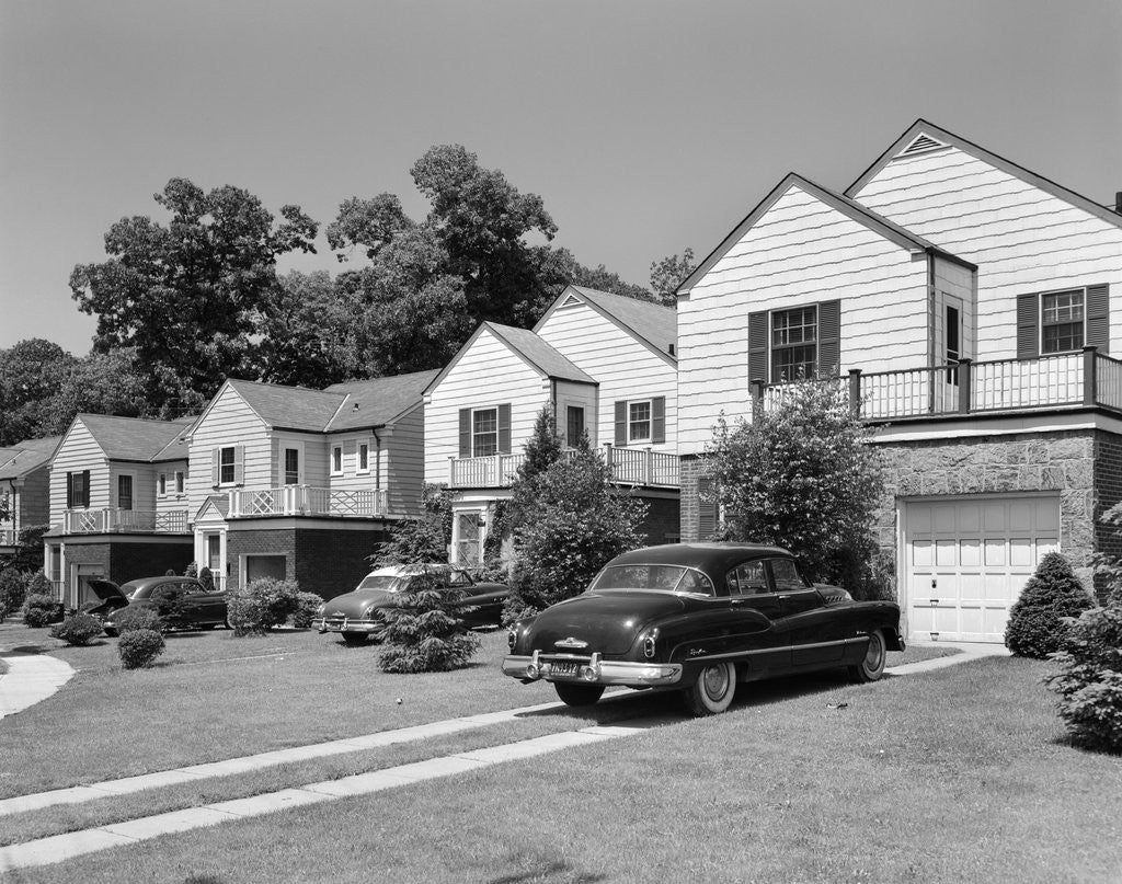 Detail of 1950s suburban street of typical homes queens new york by Corbis