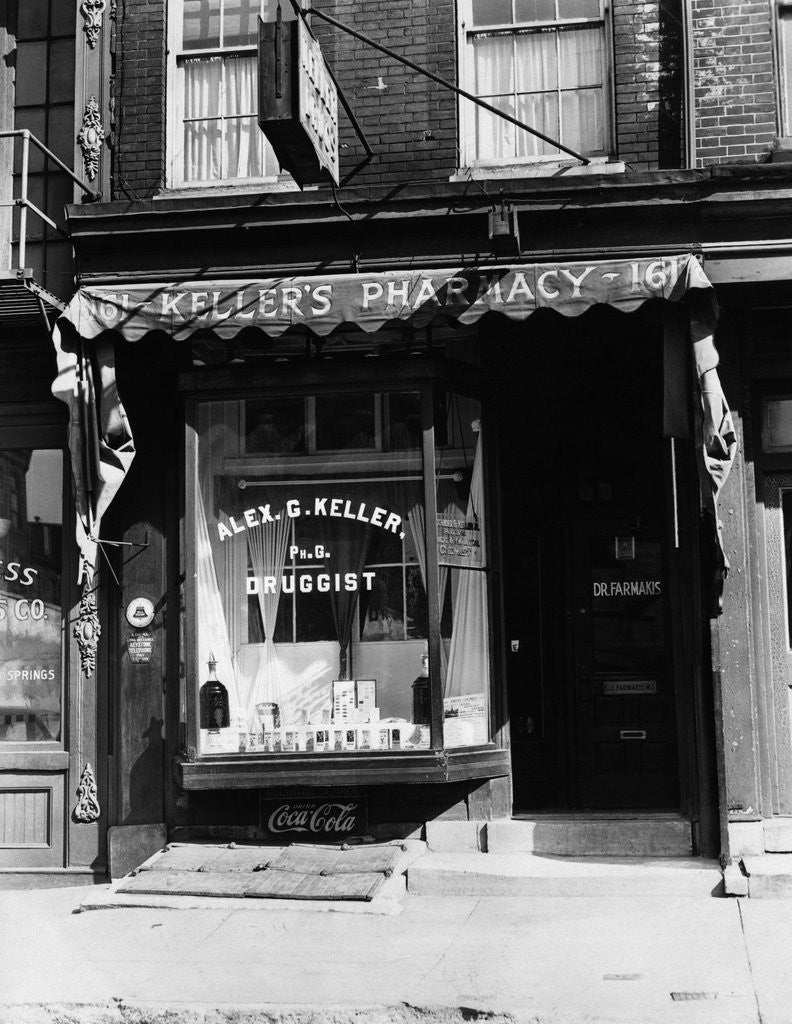 Detail of 1930s pharmacy storefront by Corbis