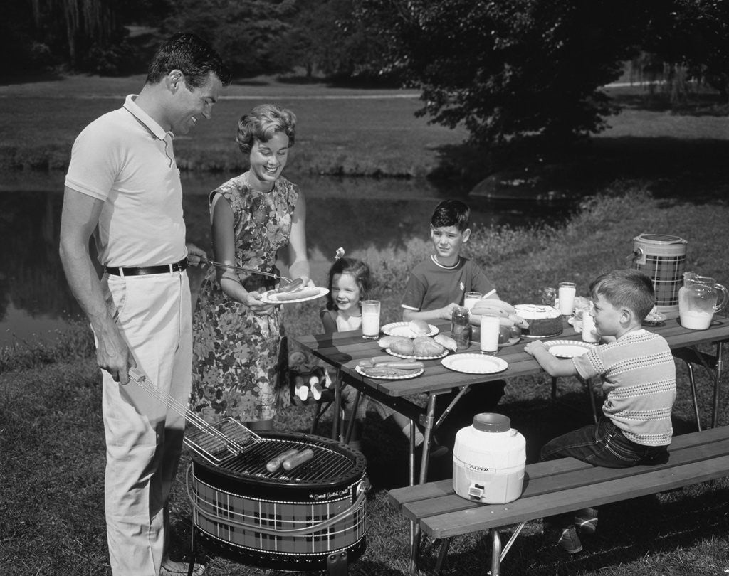 Detail of 1950s family picnic bar-b-cue mom dad children by Anonymous