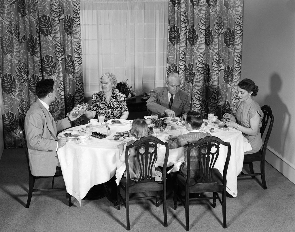 Detail of 1950s three generation family dinner by Anonymous