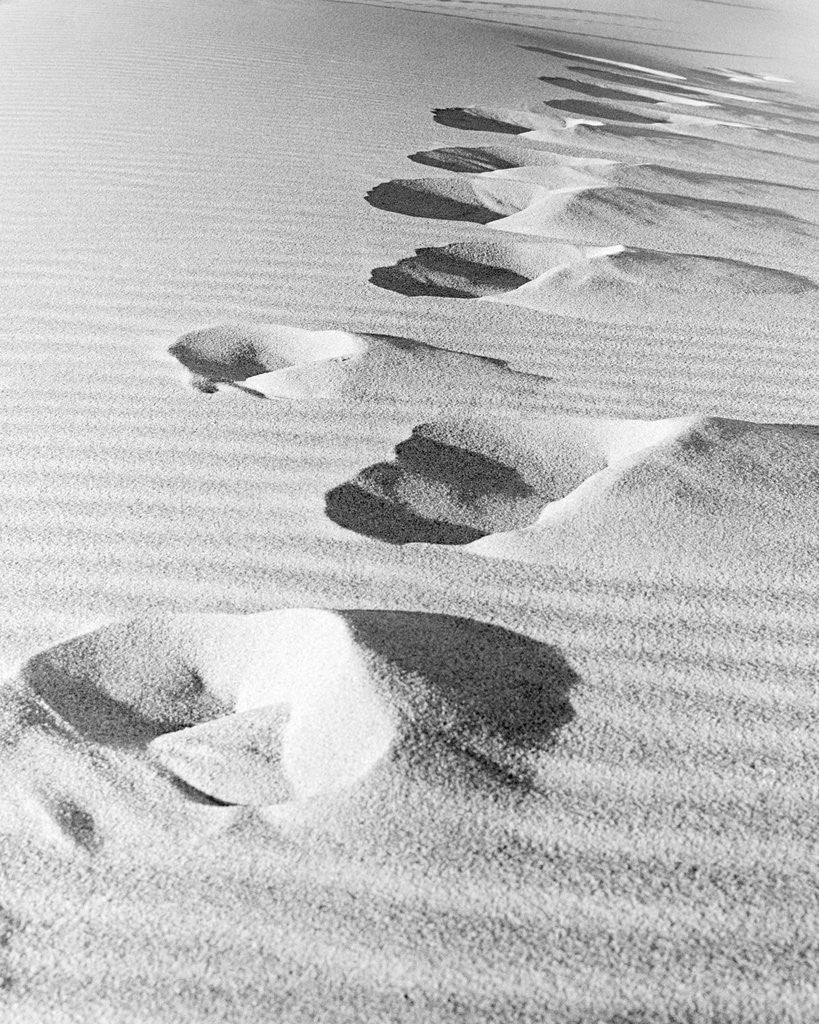 Detail of 1950s footsteps in sand dunes by Anonymous