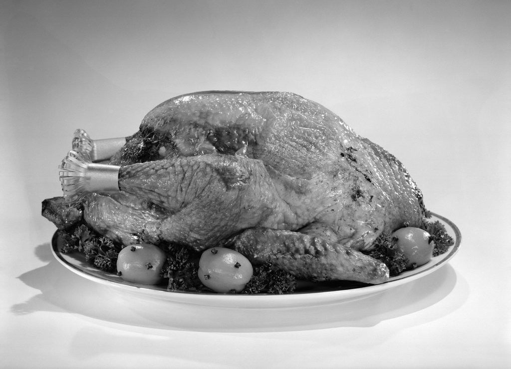 Detail of 1950s roasted turkey on a platter by Anonymous