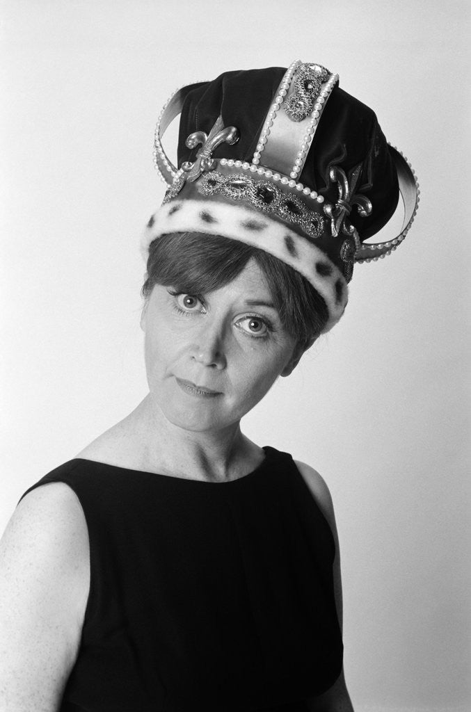 Detail of 1970s portrait woman wearing queen's crown looking at camera by Anonymous