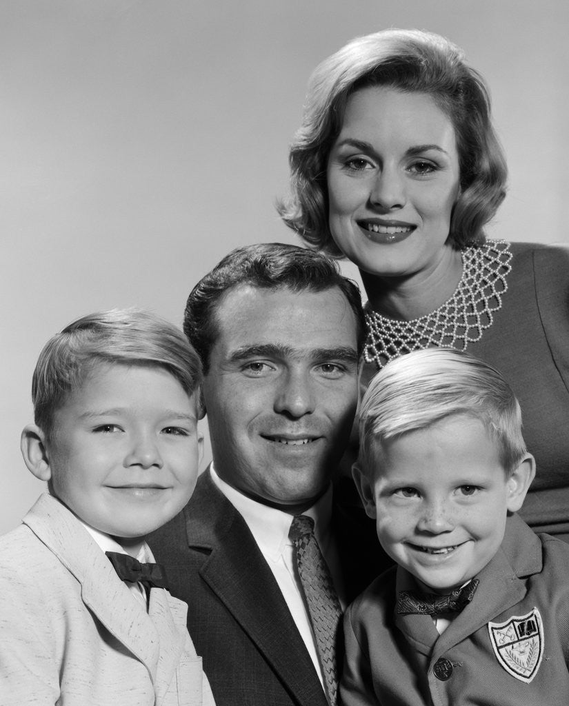 Detail of 1960s family portrait father mother two sons smiling by Anonymous