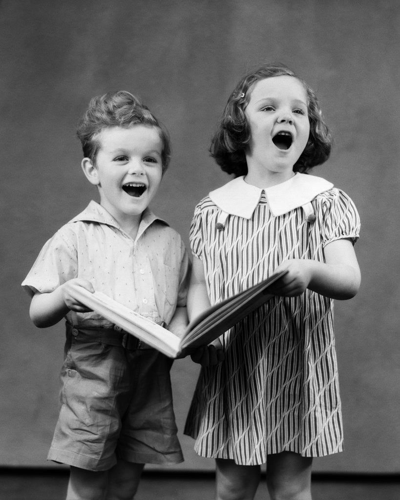 Detail of 1930s two children standing singing by Anonymous
