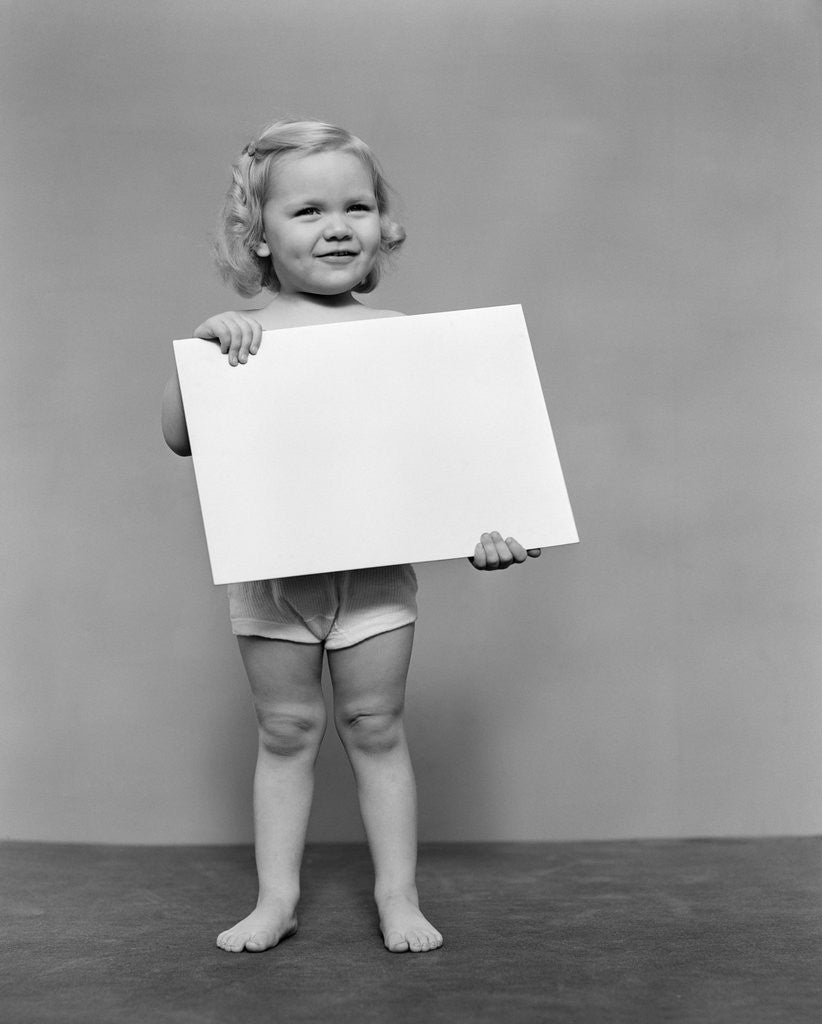Detail of 1940s blond toddler girl holding blank card sign by Anonymous