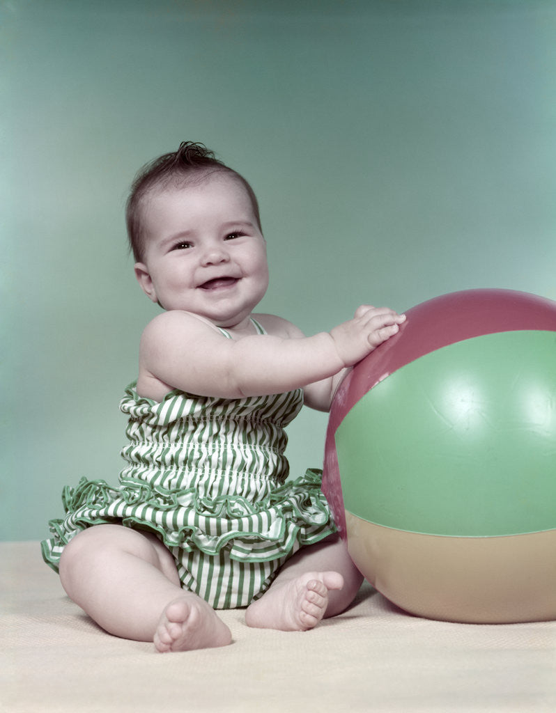 Detail of 1960s baby beach ball bathing suit by Corbis
