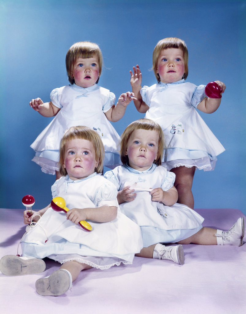 Detail of 1950s 1960s quadruplet portrait 4 red haired girls wearing dresses two seated 2 standing by Anonymous