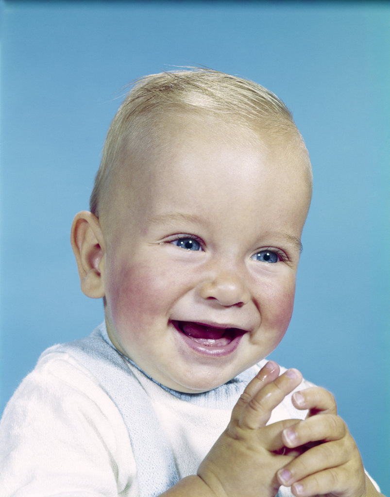 Detail of 1950s 1960s happy laughing blond baby boy by Anonymous