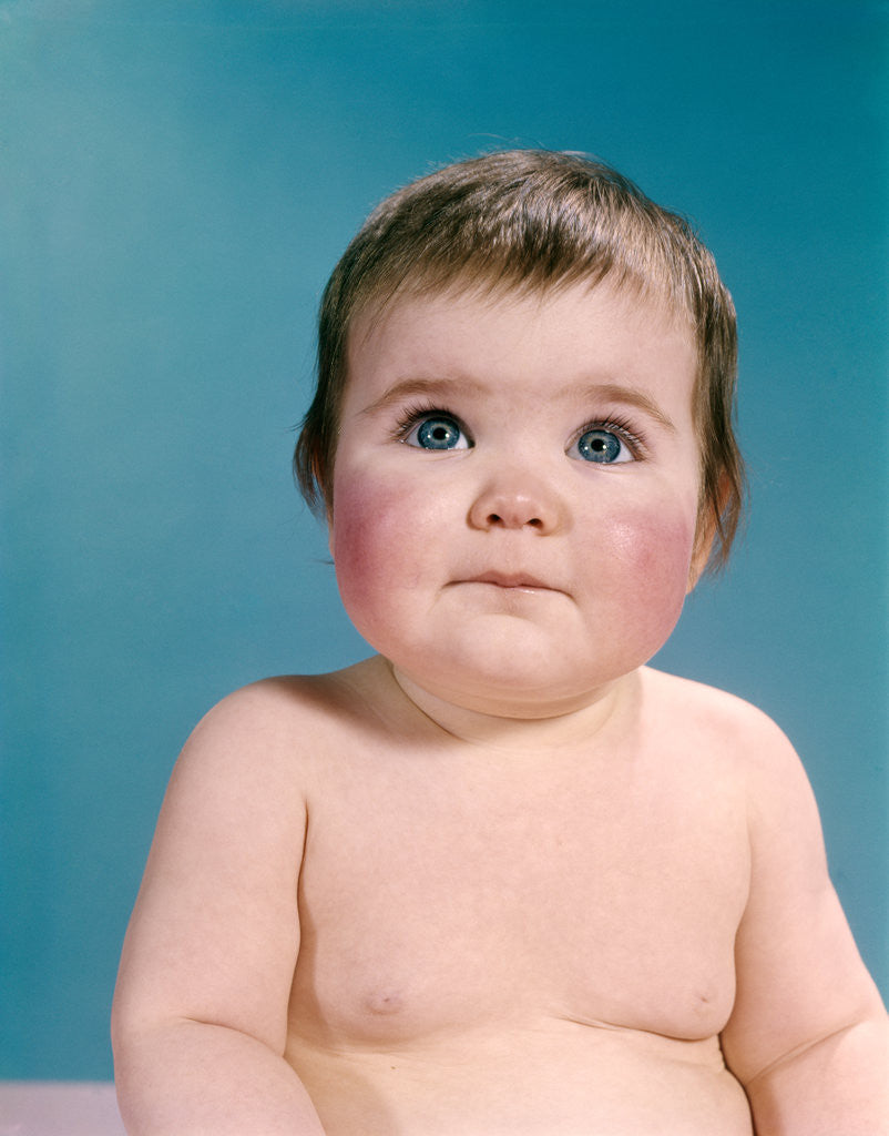 Detail of 1960s portrait sweet brunette baby blue eyes looking up by Anonymous