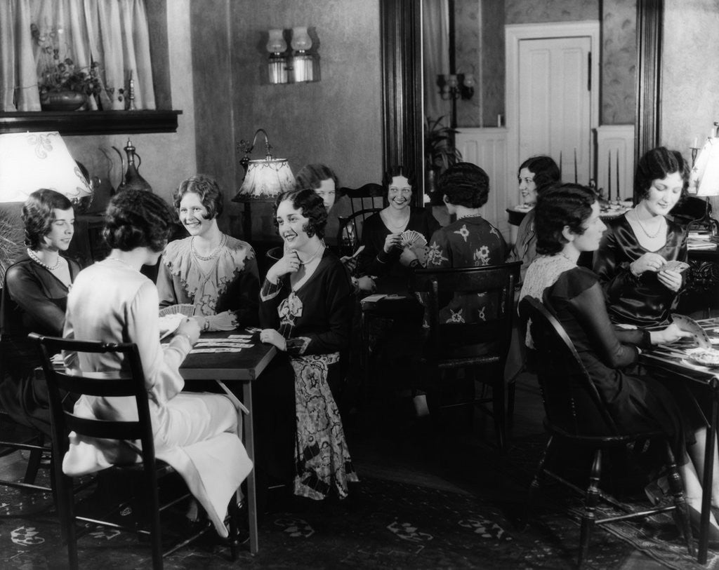 Detail of 1930s groups of women seated at three tables at card party by Anonymous