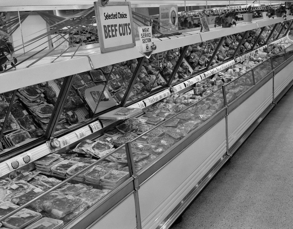 Detail of 1950s grocery store meat section by Corbis