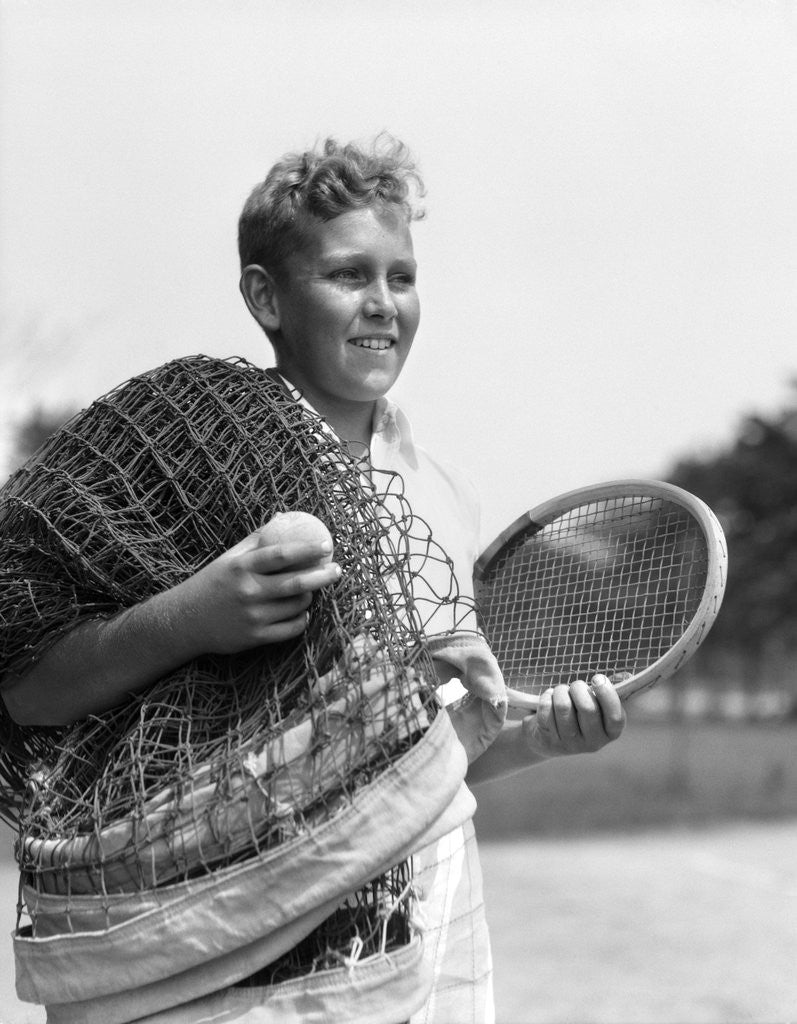 Detail of 1920s 1930s boy tennis player holding racket net and ball by Anonymous