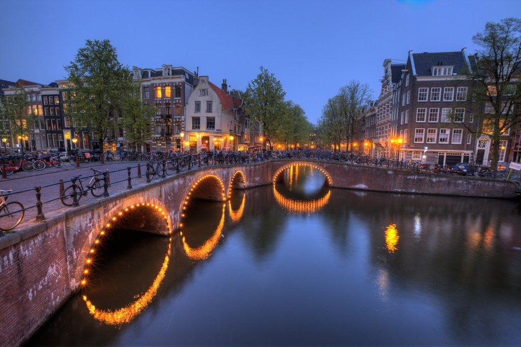 Detail of Evening light old buildings and bridge along the many Canals of Amsterdam, Netherlands by Anonymous