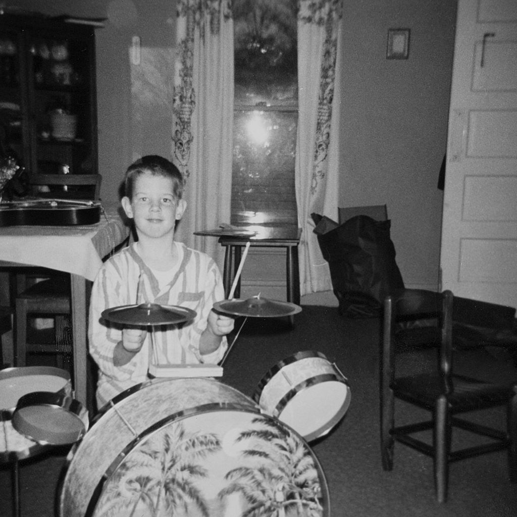 Detail of Ten year old boy on drum set, ca. 1969. by Anonymous
