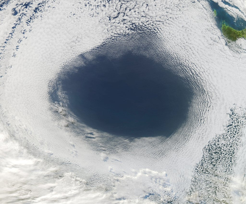 Detail of Cloud hole caused by intense high pressure system by Corbis
