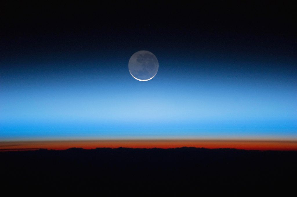 Detail of Crescent moon photographed from orbit aboard the International Space Station by Anonymous