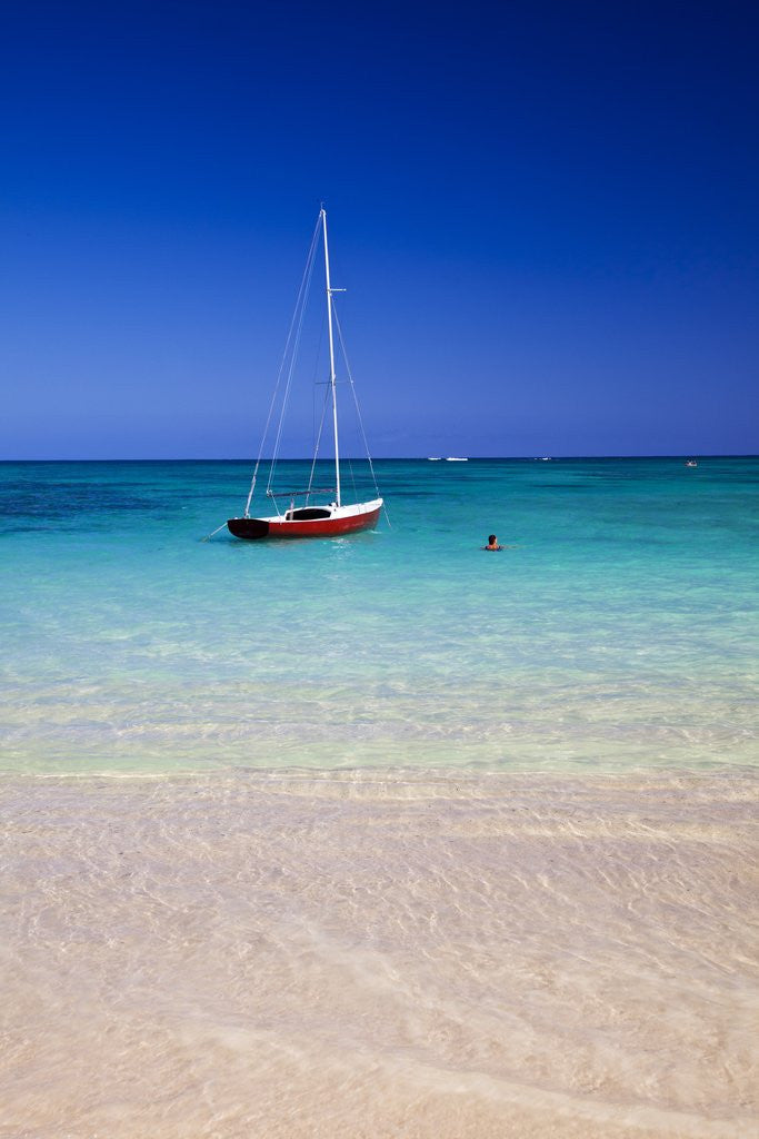 Detail of Sail Boat at Anchor in Blue Water With Swimmer by Anonymous