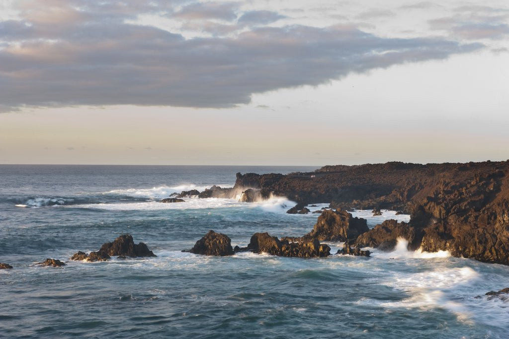 Detail of Waves crashing against rocky coast, Lanzarote, Spain by Corbis