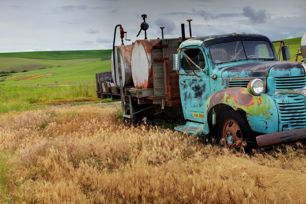 Detail of Old Field Fuel Truck With Multi Color paint by Anonymous