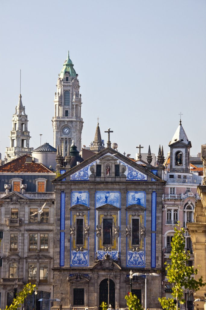 Detail of The church of St. Anthony of Congregados with blue and white azulejos tiles on the wall. The clock by Anonymous