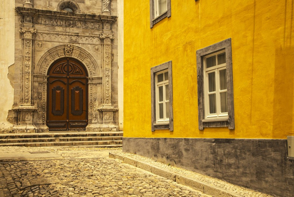 Detail of A street in Tavira leading to the entrance of a church by Anonymous