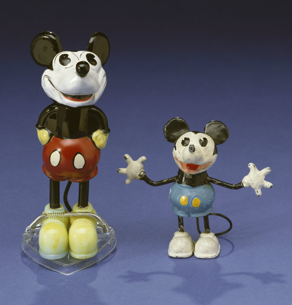 Detail of A Mickey Mouse figural perfume bottle, France, and a Mickey Mouse lead figure, Germany, both circa 1930s by Corbis