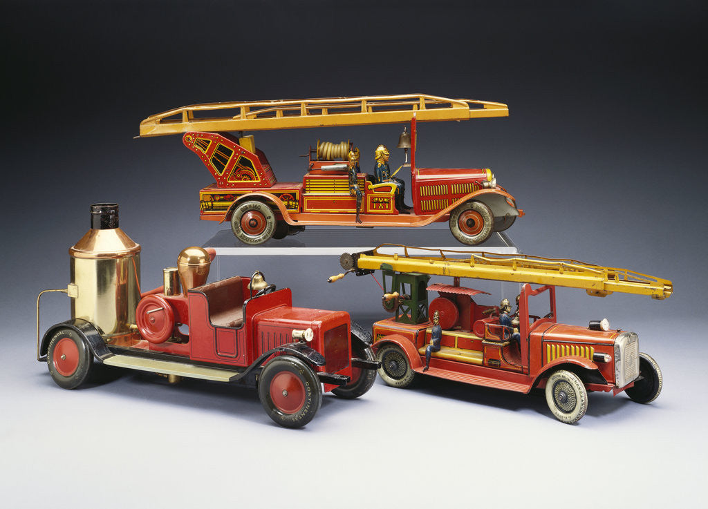 Detail of A Tipp and Company tinplate keywind overhead ladder fire engine with a Bing heavy tinplate fire pumper and a Gunthermann tinplate windup fire ladder truck by Anonymous