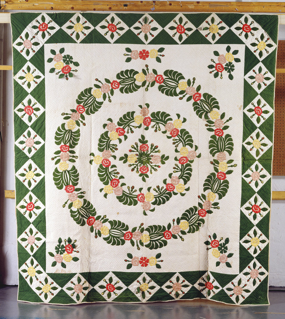 Detail of A pieced and appliqued cotton quilted coverlet by Anonymous