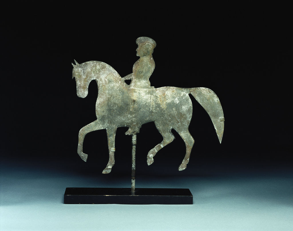 Detail of A silhouette horse-and -rider weathervane by Corbis