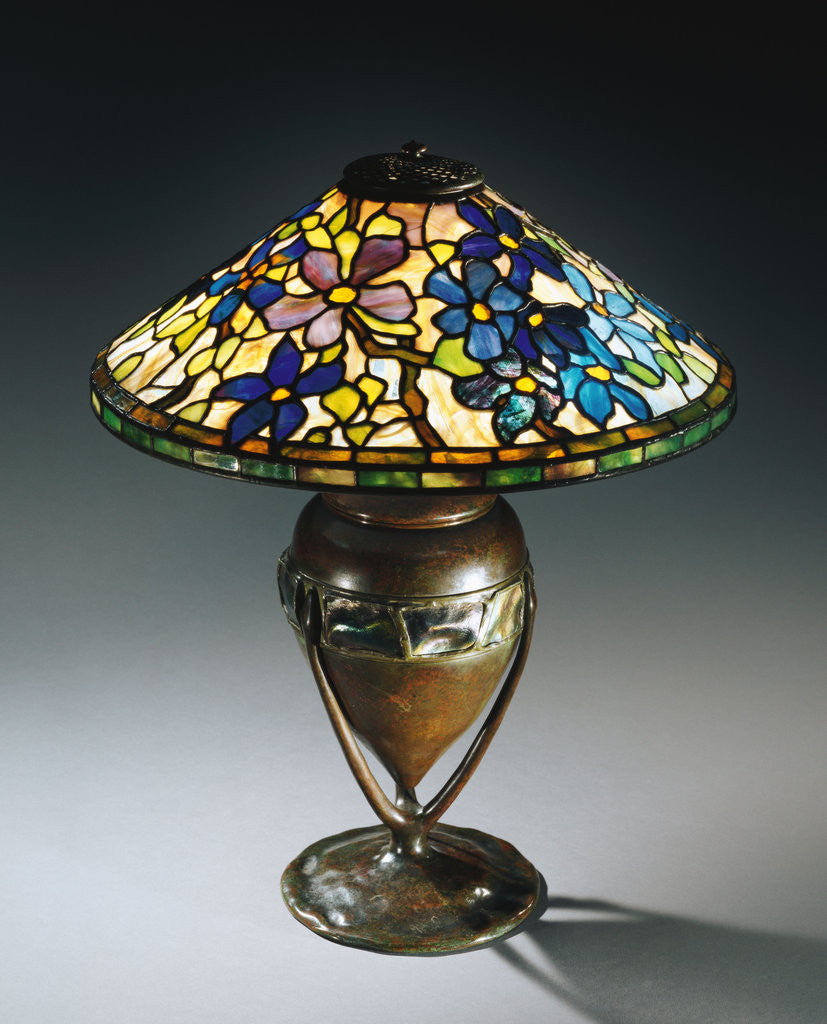 Detail of Tiffany Studios 'Clematis' leaded glass and bronze table lamp by Anonymous