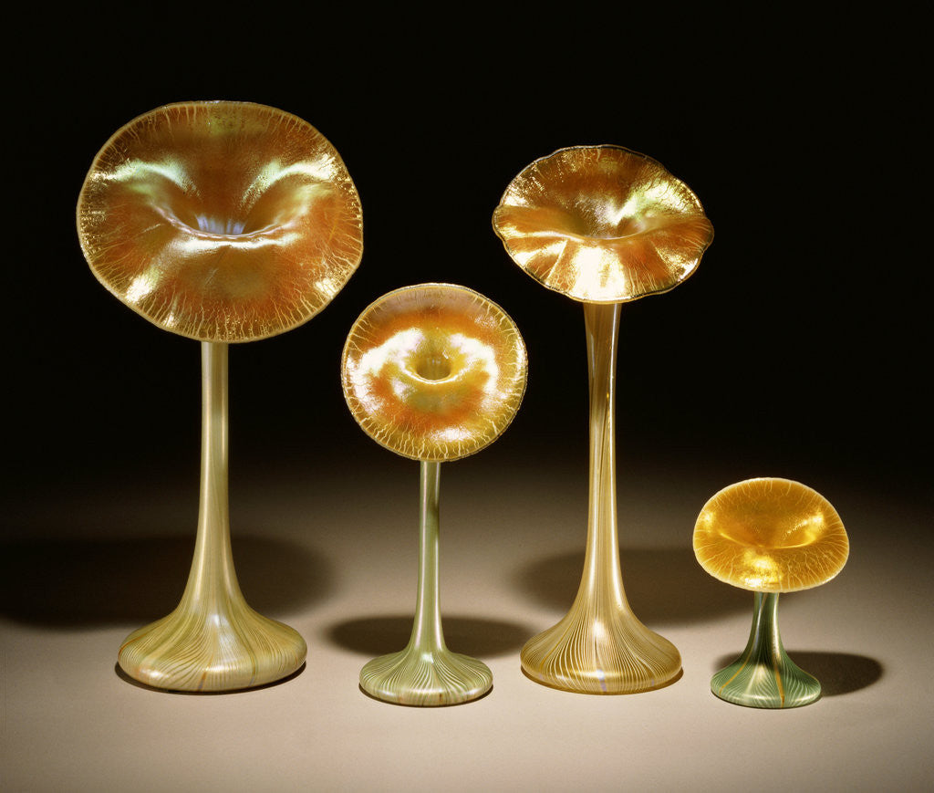 Detail of A group of Quezal Iridized glass 'Lily' vases by Anonymous