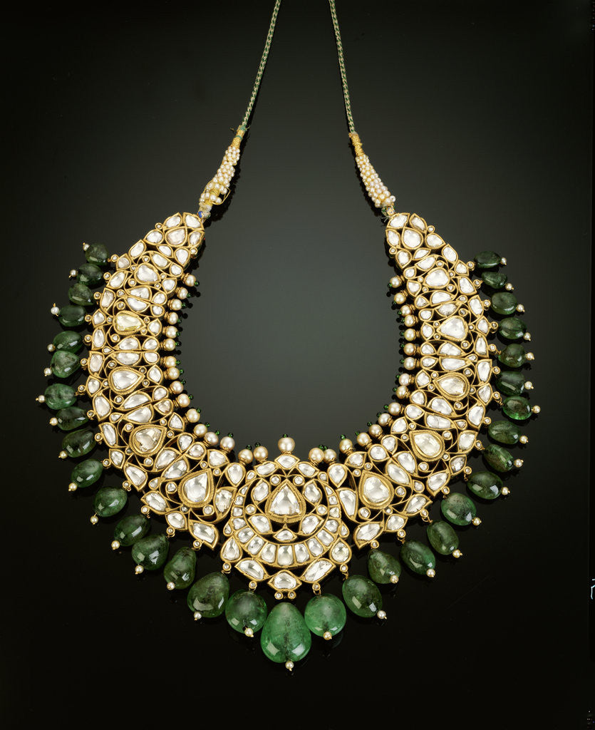Detail of An antique Indian diamond, emerald and enamel necklace by Corbis