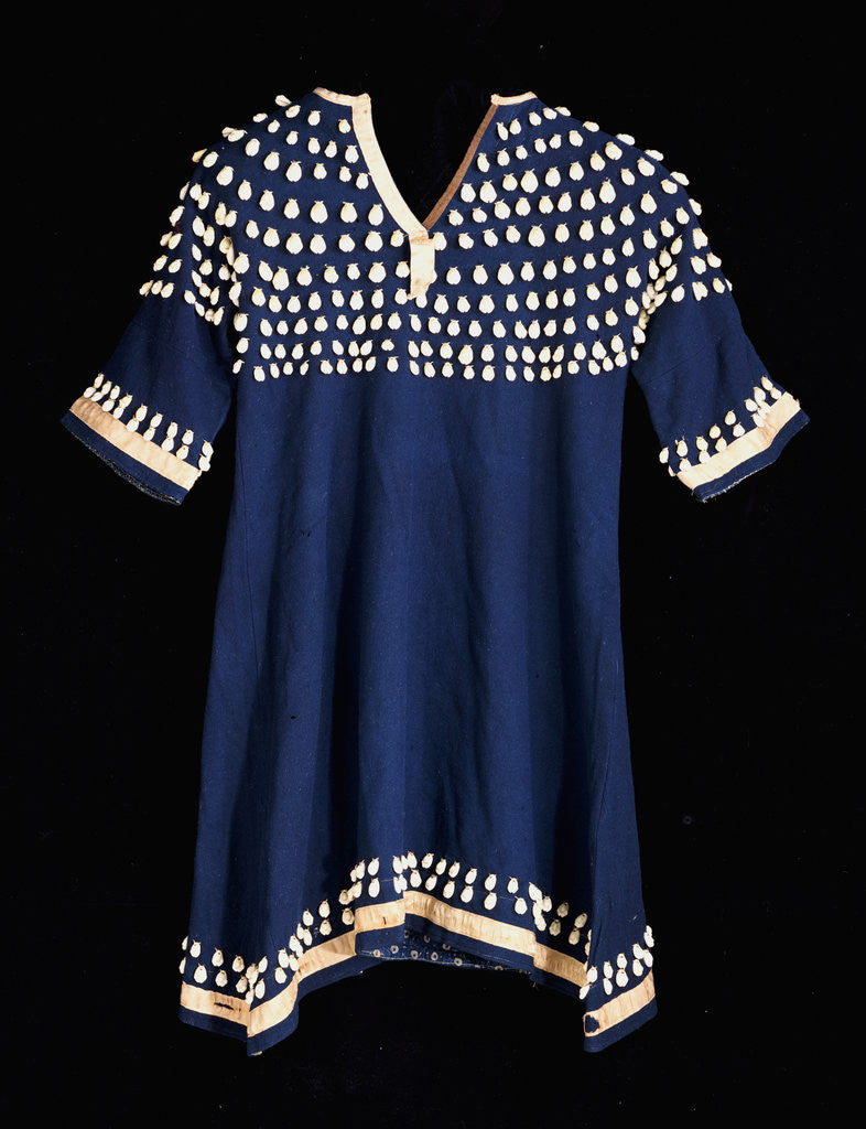 Detail of A Hunkpapa Sioux girl's dress of blue wool cloth trimmed with cowrie shells by Corbis
