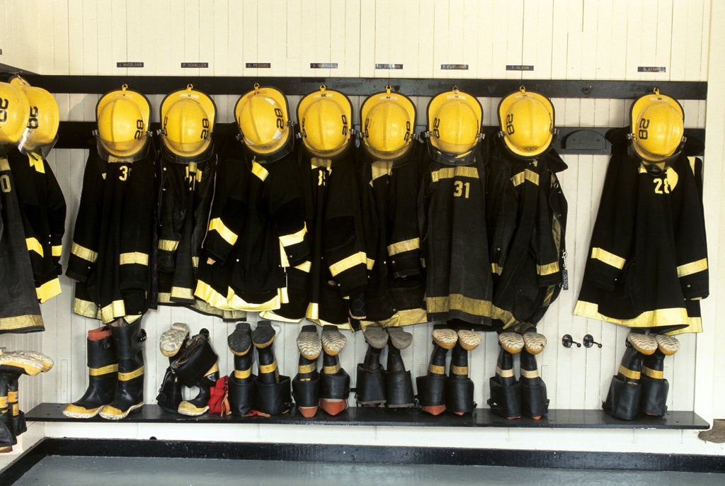 Detail of 1990s Firefighter Gear Hanging In Firehouse by Anonymous