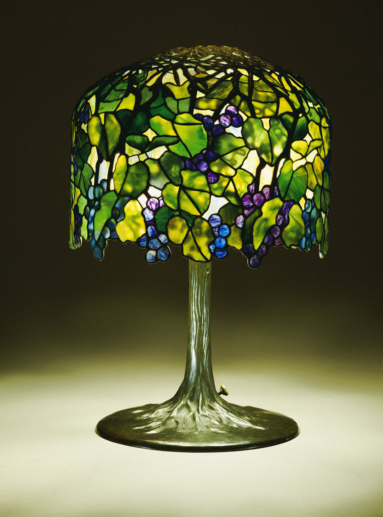 Detail of Tiffany Studios 'Grape' leaded glass and bronze table lamp by Anonymous