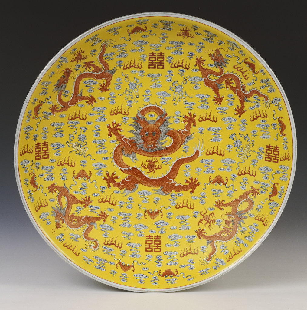 Detail of A large iron-red yellow ground dragon dish, the centre of the interior depicting a large full-faced dragon and flaming pearl by Anonymous