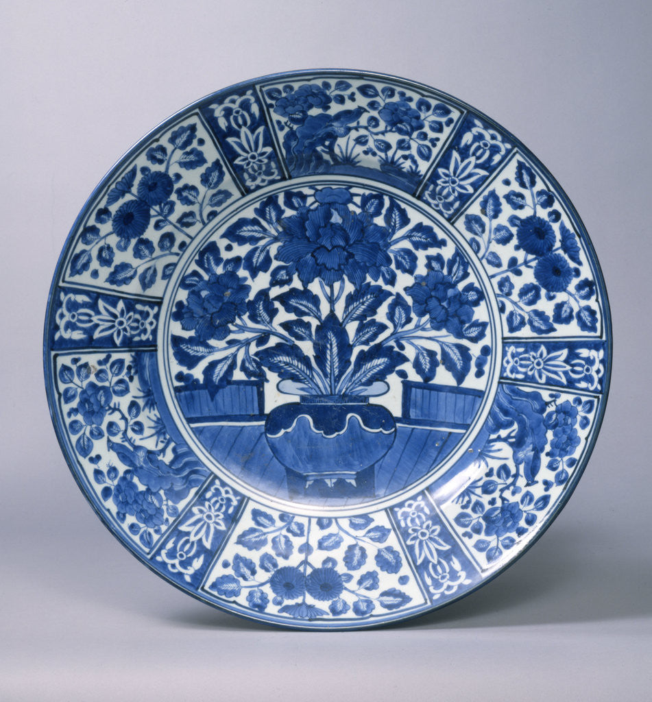Detail of A fine Arita blue and white charger with peony sprays on on veranda by Anonymous
