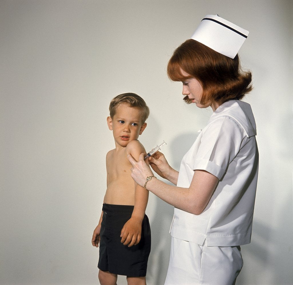 Detail of 1960s Woman Nurse Give Injection Needle To Little Boy Arm Vaccine Vaccination Prevention Immunize Inoculate Medicine by Anonymous