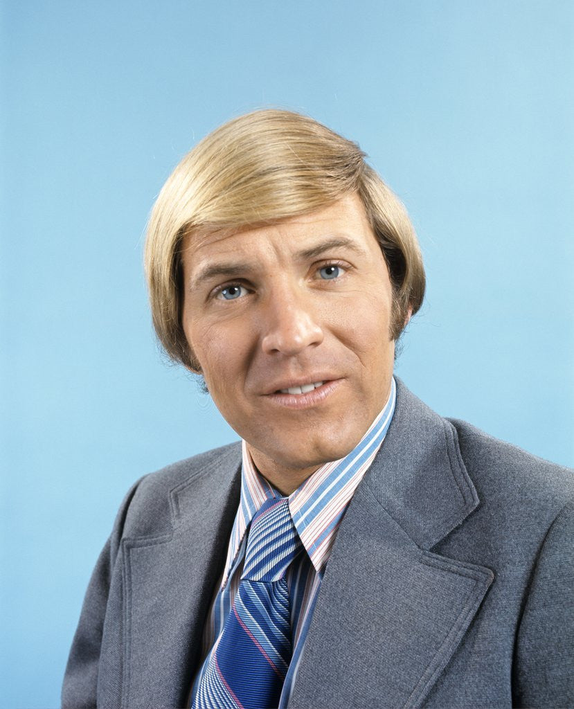 Detail of 1970 1970s Retro Portrait Of Blonde Man Wearing Grey Suit Blue Striped Tie by Corbis