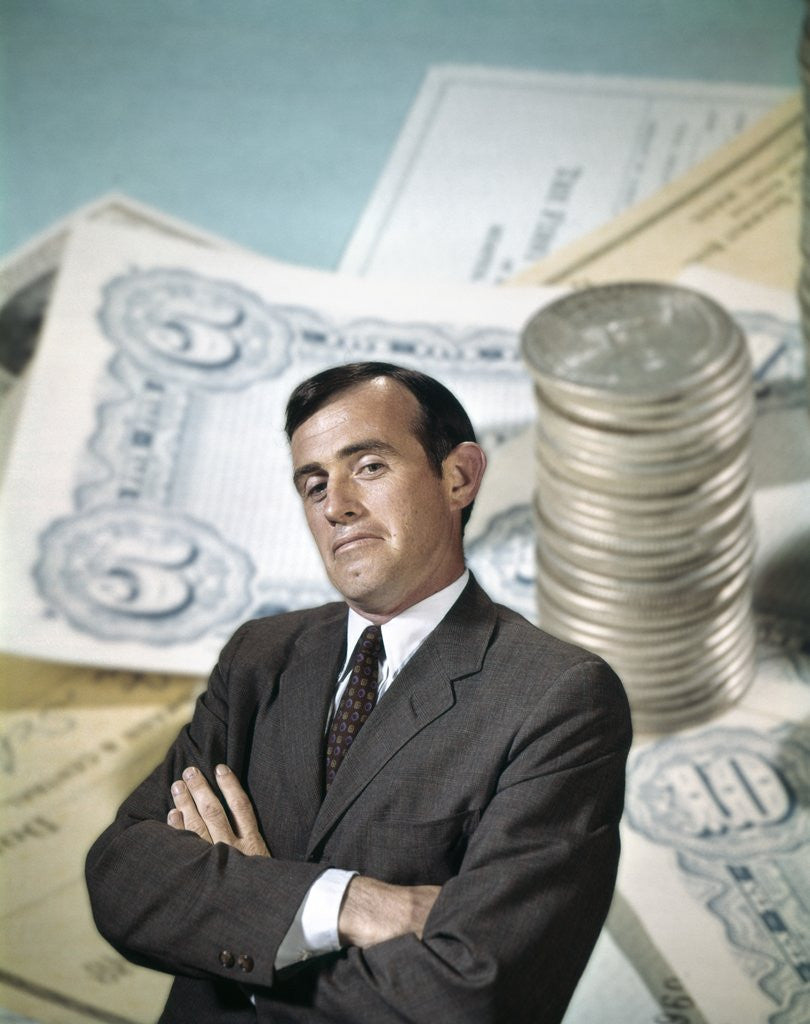 Detail of 1960s Businessman Facial Expression Background Money Checks Coins Finance Banking Business Retro by Anonymous