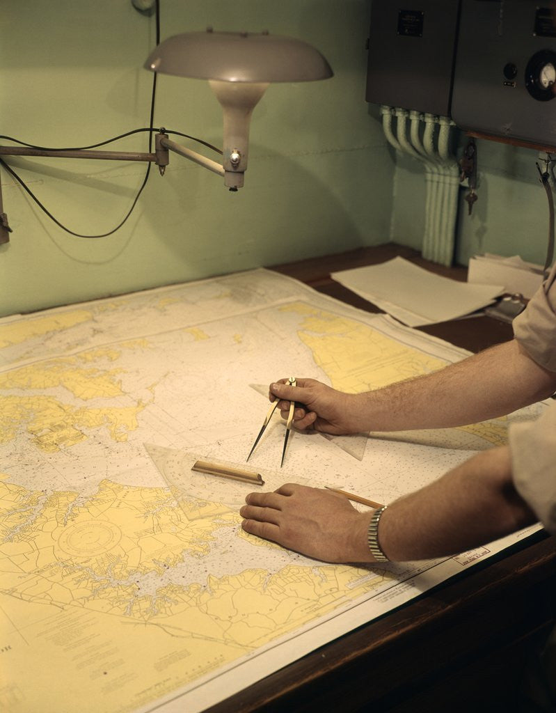 Detail of 1960s Male Hands Using Nautical Navigation Tools Compass Map Chart Charting A Course by Anonymous